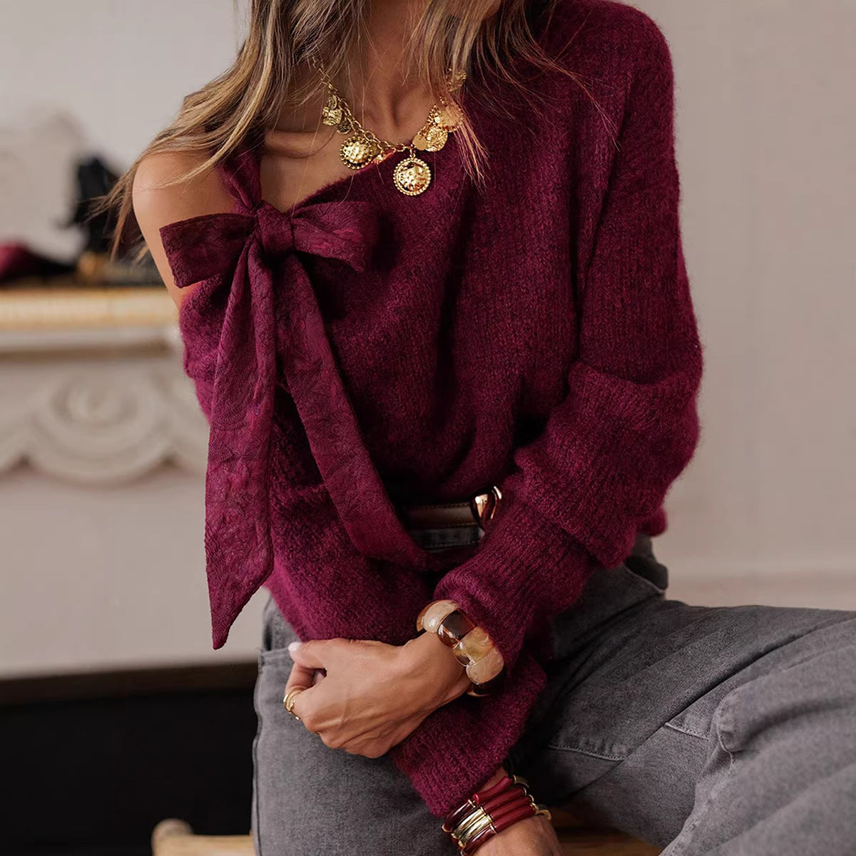 Pull femme élégant à nœud manches longues