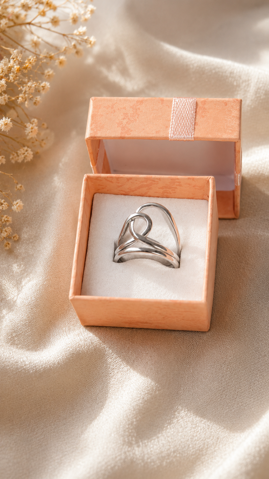 Bague ajustable argentée design infini – Acier inoxydable