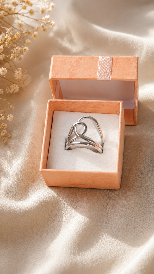 Bague ajustable argentée design infini – Acier inoxydable